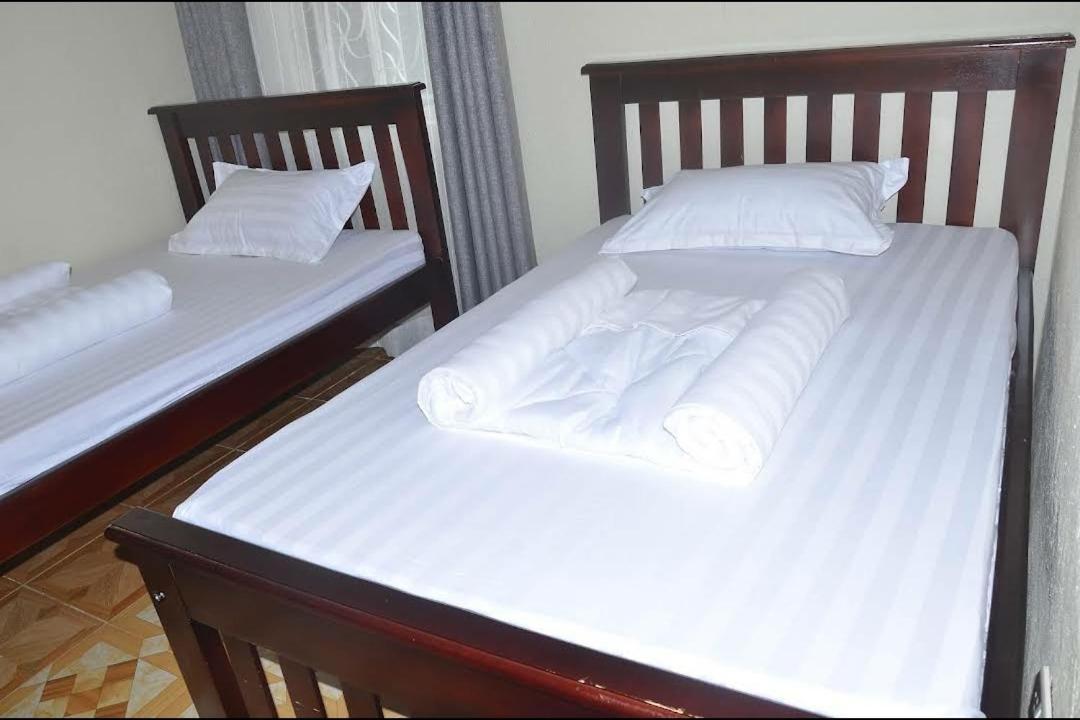 Migingo Suites Entebbe Exteriör bild